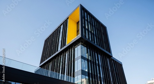 Modern Black Building with Yellow Accent