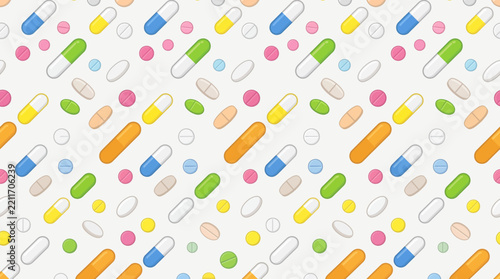 Seamless Pattern of Colorful Capsules and Pills on White Background