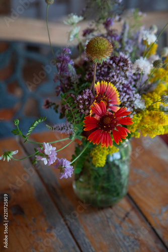 Bouquet of summer flowers on the garden background