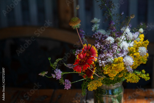 Bouquet of summer flowers on the garden background