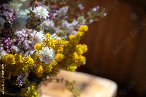 Bouquet of summer flowers on the garden background
