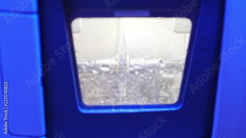 Optical tech processes precision eyeglass lenses