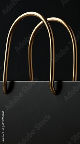 Cinematic Slow Camera Slide Across a Static Plain Matte Black Shopping Bag with Gold Handles