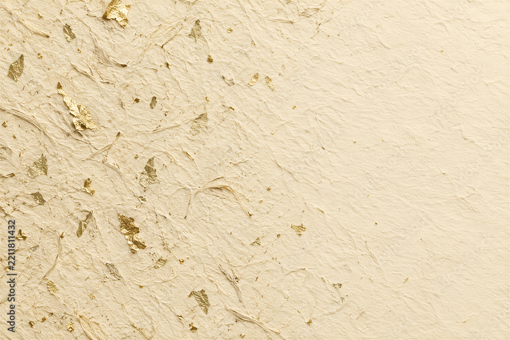 Fototapeta premium Textured handmade paper background with gold leaf flakes, cream colored fibrous surface, elegant organic pattern. Luxury stationery, wedding invitation template, fine art backdrop.