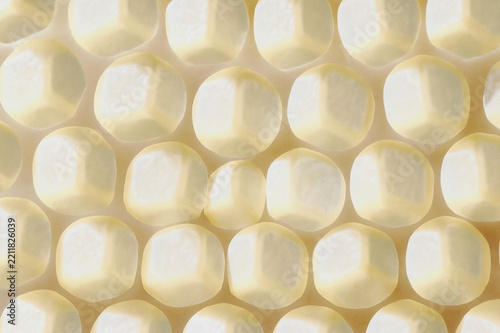 Soft Golden Honeycomb Macro Background with Natural Wax Cells