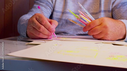 Beautiful cinematic time-lapse of designer drawing process using multicolor gel ink pens on paper. Ideal for creative inspiration videos, stock footage B-roll, and lifestyle blogs.
