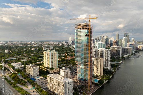 Skyscraper construction in Miami, Florida. USA real estate development. Big city urban landscape with high-rise buildings