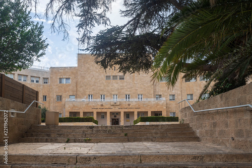 Jerusalem, Israel, 26 September 2026. Stone facade of  Jewish Agency building on King George Street, framed by mature trees and broad stone steps.