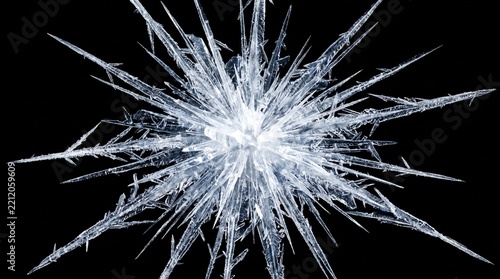 Icicle formation with radiating crystalline structure against a black background