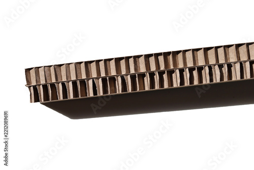 Thick brown honeycomb paper padding for shockproof product packaging.