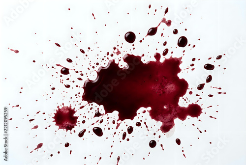 Red Wine Splash Spreading On White Surface