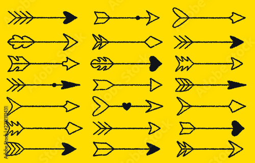 Black hand drawn arrows with various tail and head designs arranged in rows on a bright yellow background.