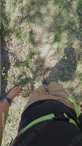 Hiker shadow on dirt trail