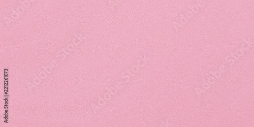 A high resolution close up shot of a smooth pale pink paper texture with a subtle grainy pattern