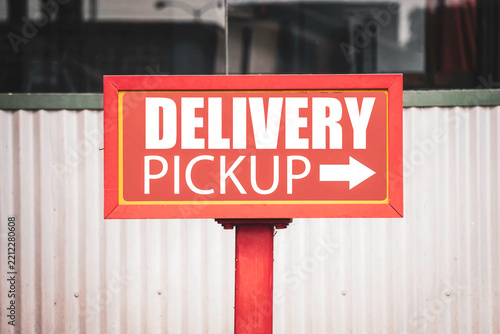 Delivery pickup sign with arrow