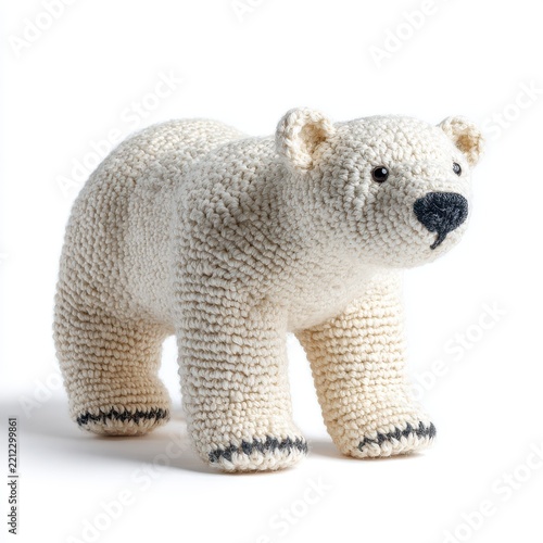 Knitted White Polar Bear Soft Toy With Black Nose And Stitched Details Standing On White Background