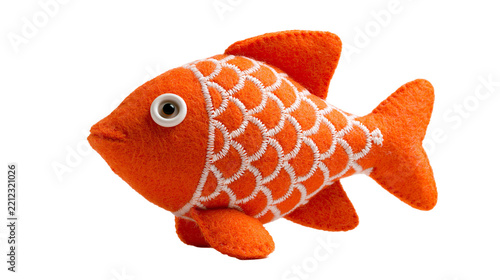 Orange felt fish toy with white embroidered scale pattern and plastic eye