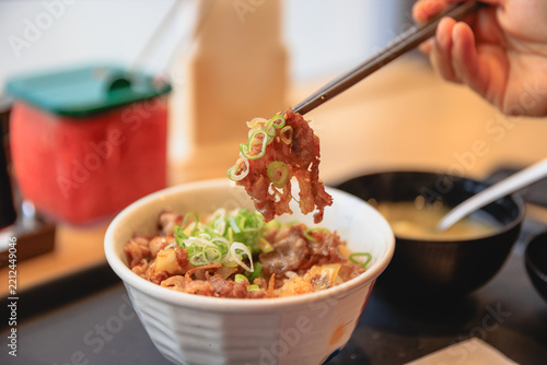 People eating japanese food beef  bowl in Japan