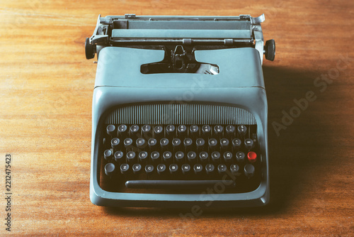 Old typewriter on wood