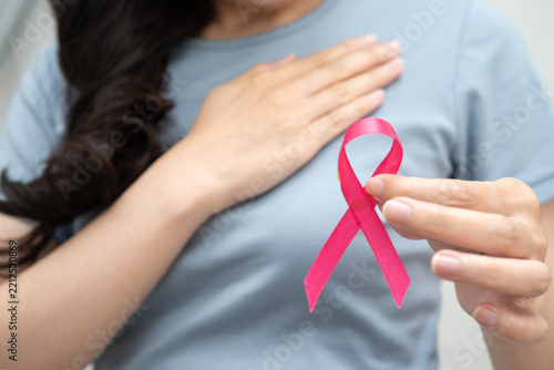 Asian woman with pink ribbon, World Breast Cancer Day at October.