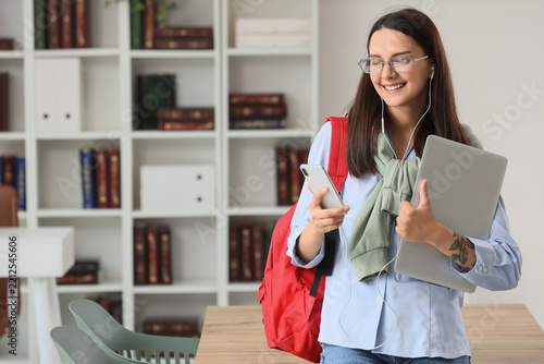 Higher education and student lifestyle, happy young woman with laptop and bac...