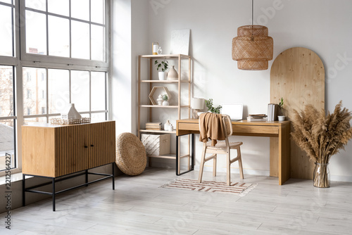 Remote work and home office interior, modern workspace with laptop and natura...