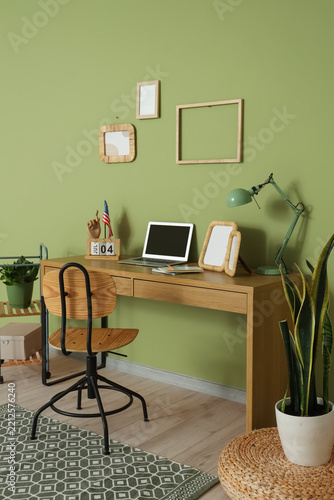 Remote work and home office setup, freelancer workspace with laptop and desk ...