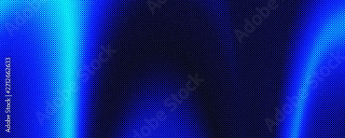 Abstract blue glowing light streaks on dark background with grain effect