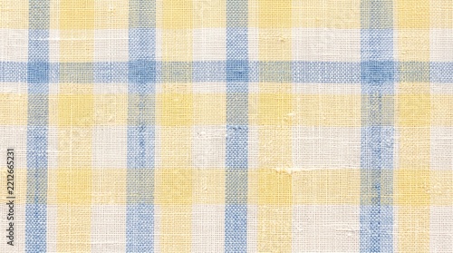 Blue and yellow plaid checkered cotton fabric textile pattern background surface macro view
