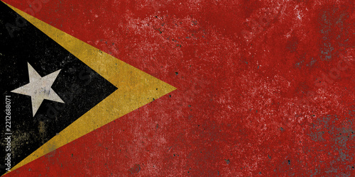 East Timor national flag painted on textured wall mural background