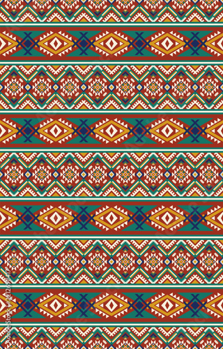 Seamless Ethnic Inspired Kilim Style Geometric Eye Diamond and Medallion Border Pattern in Rust and Teal