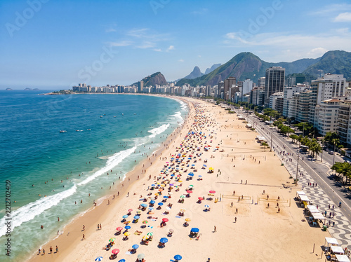 Aerial view of crowded Copacabana beach and coastline in Rio de Janeiro