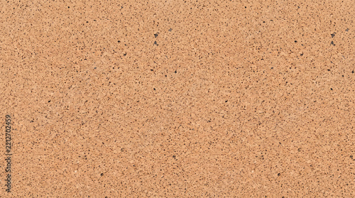 Natural brown cork texture background with detailed grainy surface pattern.