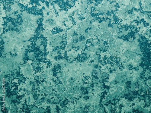 Pale teal mottled stone texture background