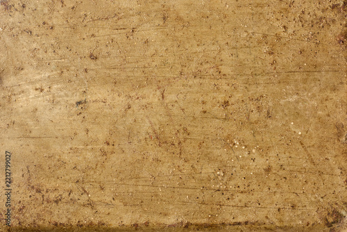 old scratched metal surface texture, rusty brown and golden brass material with grunge pattern in close-up view, industrial design backdrop