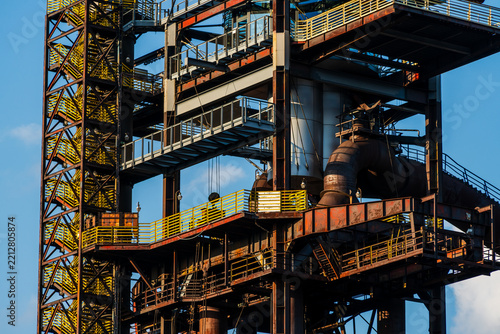 View of the industrial steel structures and yellow staircases of the Dolni Vitkovice complex in Ostrava, Moravian-Silesian Reg, Czechia.