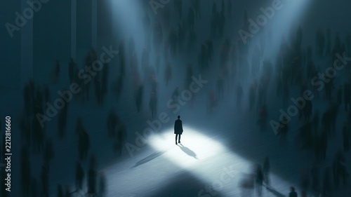Person standing alone in spotlight amidst blurred dark crowd symbolizing individuality leadership and finding a path
