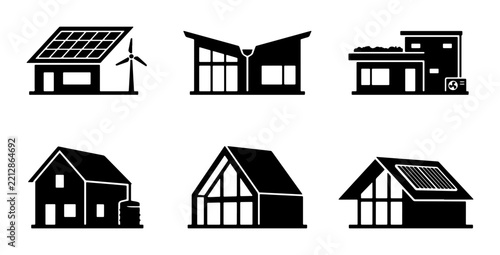 Various house silhouettes with solar panels and wind turbine for logo