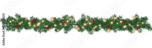 Pine garland with red holly berries and fairy lights border