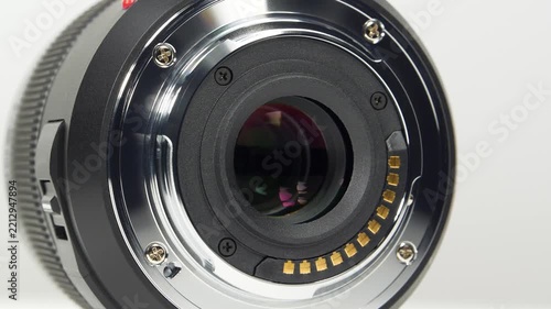 Macro lens mount designed for a camera system, providing a precise connection for macro photography equipment