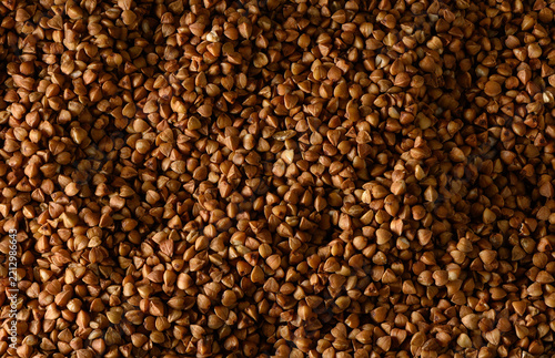Macro close-up top view of raw organic buckwheat groats