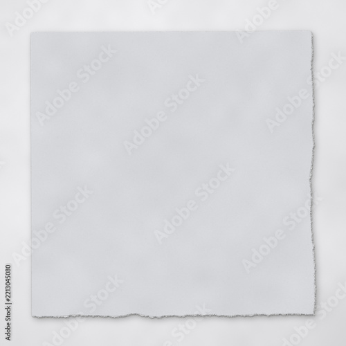 Vintage ripped torn paper frame background with ragged Deckle edges on neutral backdrop for copy space design element