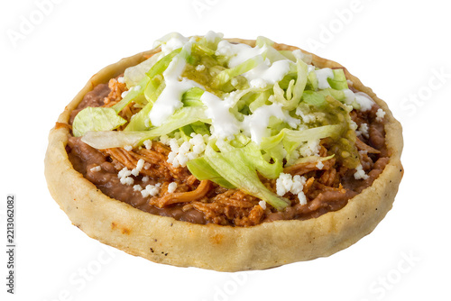 Mexican sope, small thick round masa disk with distinctive pinched Isolated on White Background