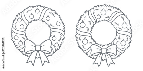 Two festive christmas wreaths decorated with baubles and silk ribbons.