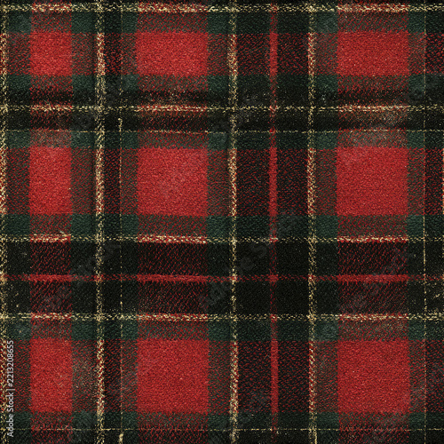 Traditional holiday plaid seamless pattern with bold red and black squares creating warm festive feeling