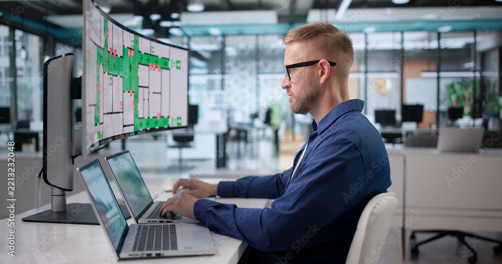 Fototapeta premium Safety Officer Carefully Reviews Emergency Exit Routes