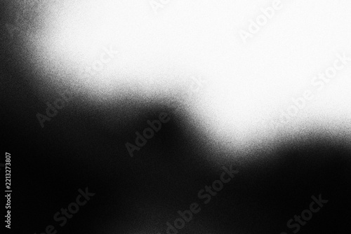 Abstract black and white gradient background with soft grainy texture