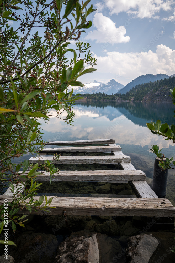 Fototapeta premium Beautiful view to old wooden dock in Garibaldi Lake, Squamish