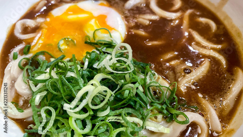 Curry nanban udon topped with a soft-boiled egg