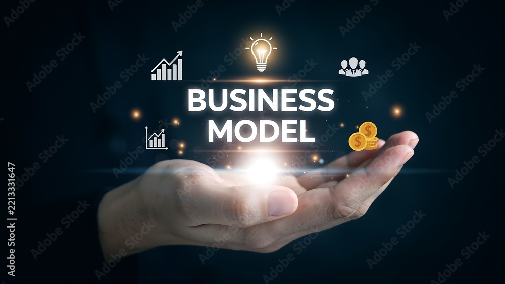 Obraz premium Business model concept with professional holding a glowing digital strategy interface